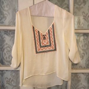 Cream flowy top with embroidery detail